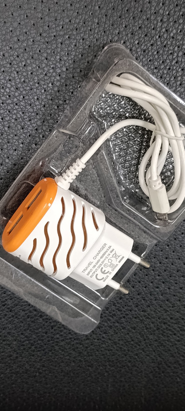 شارژر دیواری دو پورت USB مدل Travel Charger 2 in 1 همراه کابل شارژ