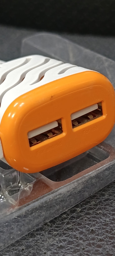 شارژر دیواری دو پورت USB مدل Travel Charger 2 in 1 همراه کابل شارژ