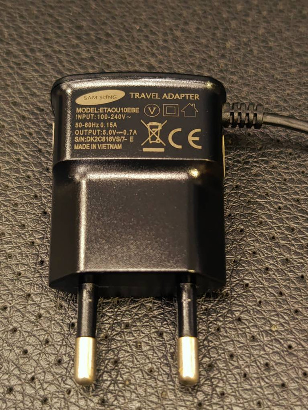 شارژر دیواری سامسونگ مدل ETA0U10EBE با کابل متصل Micro USB و خروجی ۷۰۰ میلیآمپر