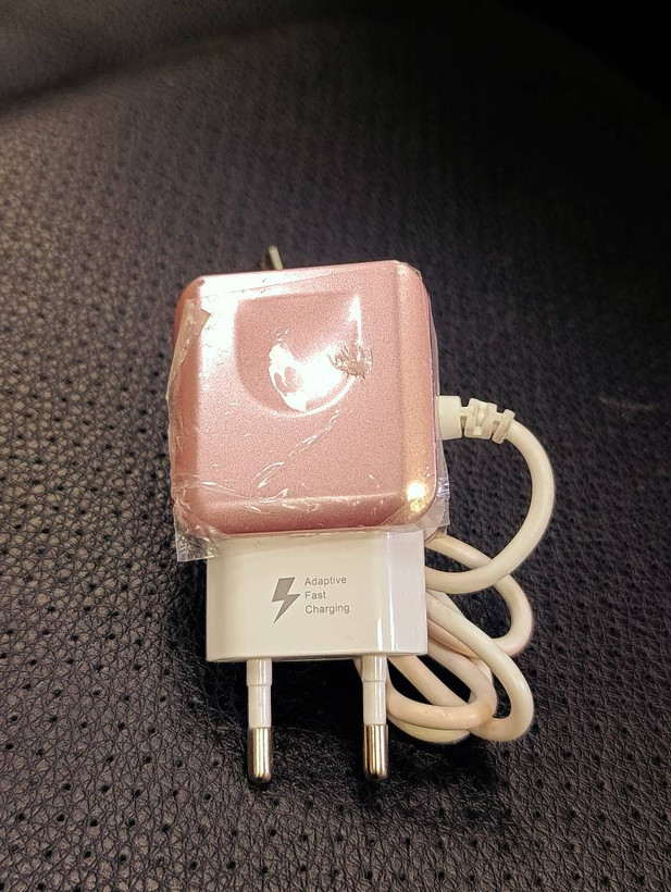 شارژر دیواری KeKe مدل F13C با دو پورت USB و کابل متصل Micro USB خروجی ۵ ولت ۲ آمپر